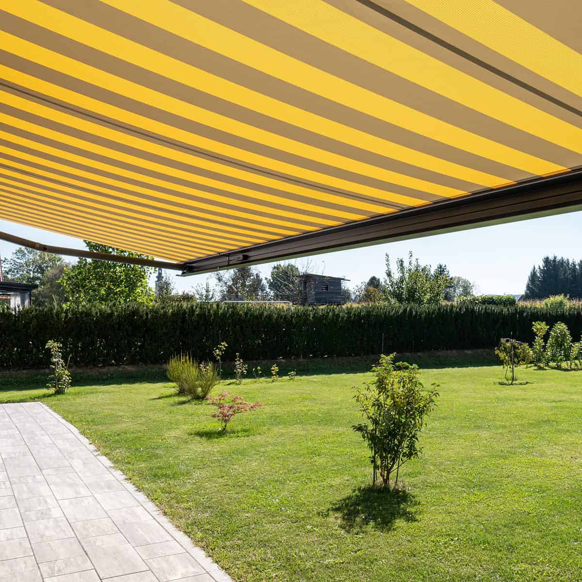 markilux MX-1 in a striped fabric covering a patio