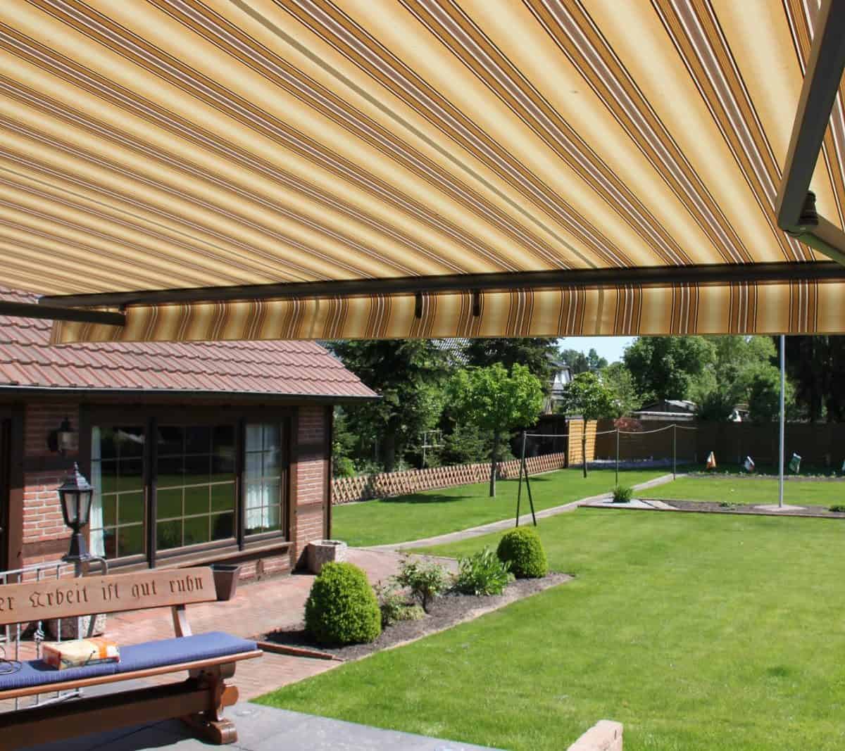 markilux 1710 semi cassette awning in beige and brown stripes