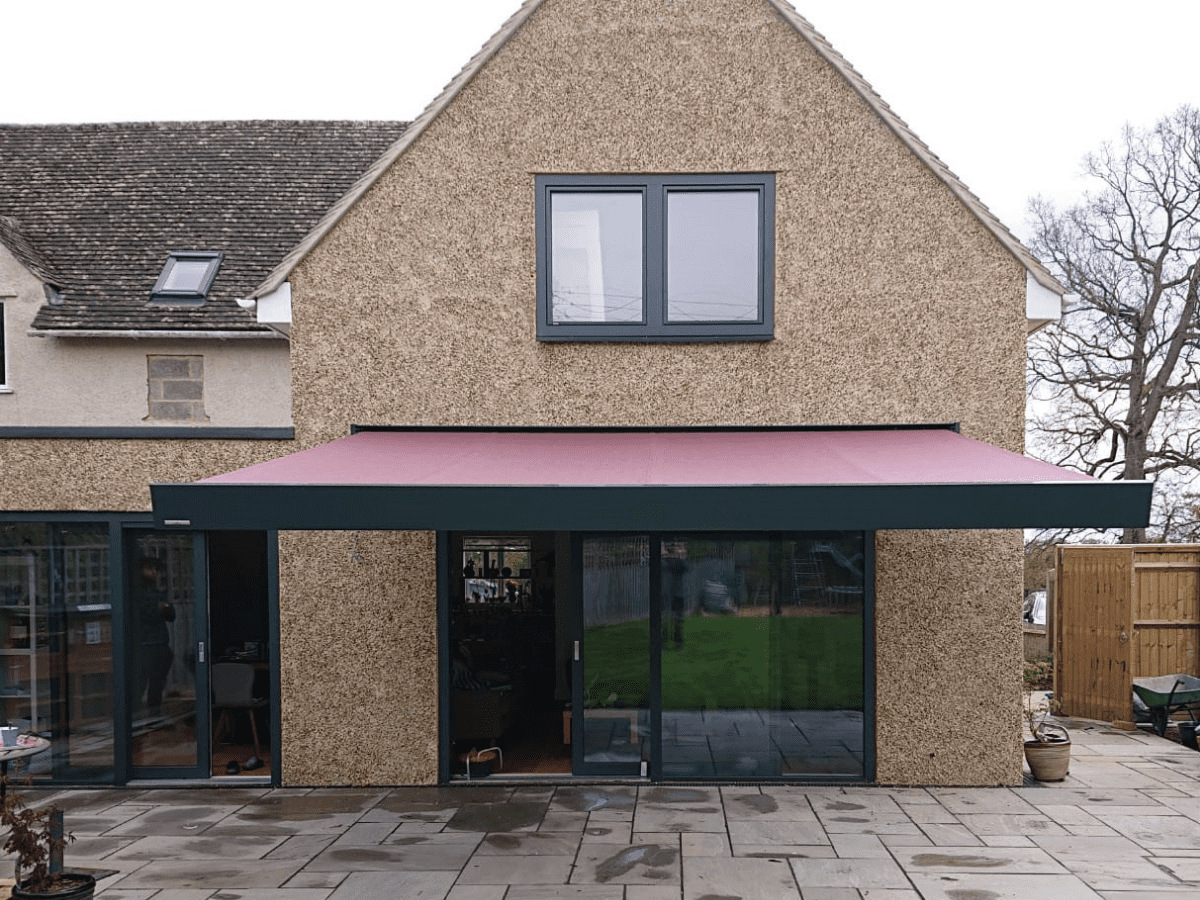 weinor Kubata cubic cassette canopy in a red RAL colour