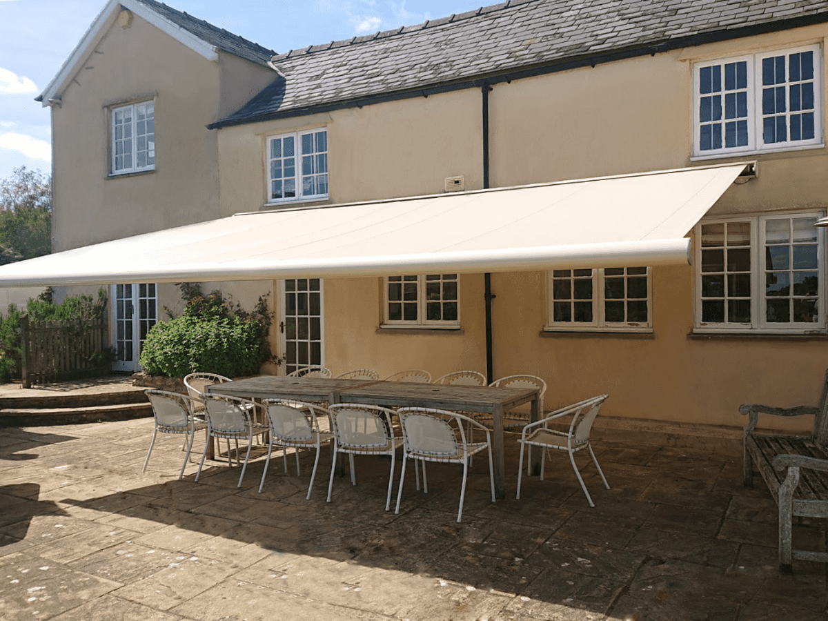 weinor Semina Life full cassette awning, fitted in Warwickshire, providing shade to outside dining area
