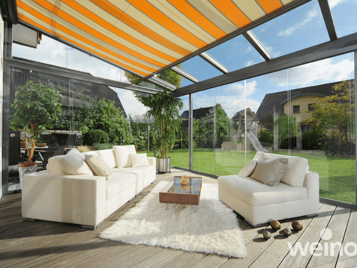 weinor Originale glass roof with vertical glass elements transforming it into a glass room
