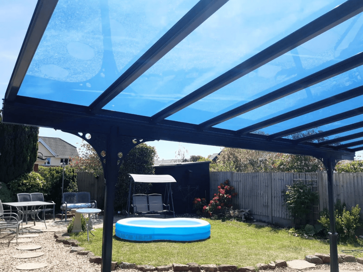 Simplicity 6 glass roof veranda with blue tinted glass