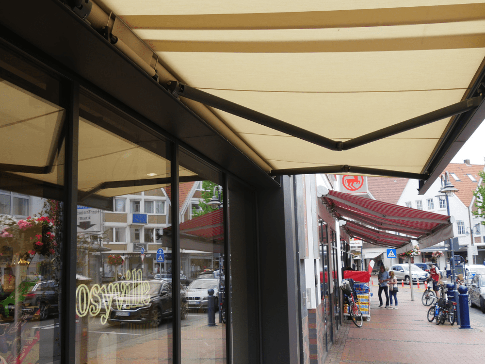 A coupled awning sheltering a shop