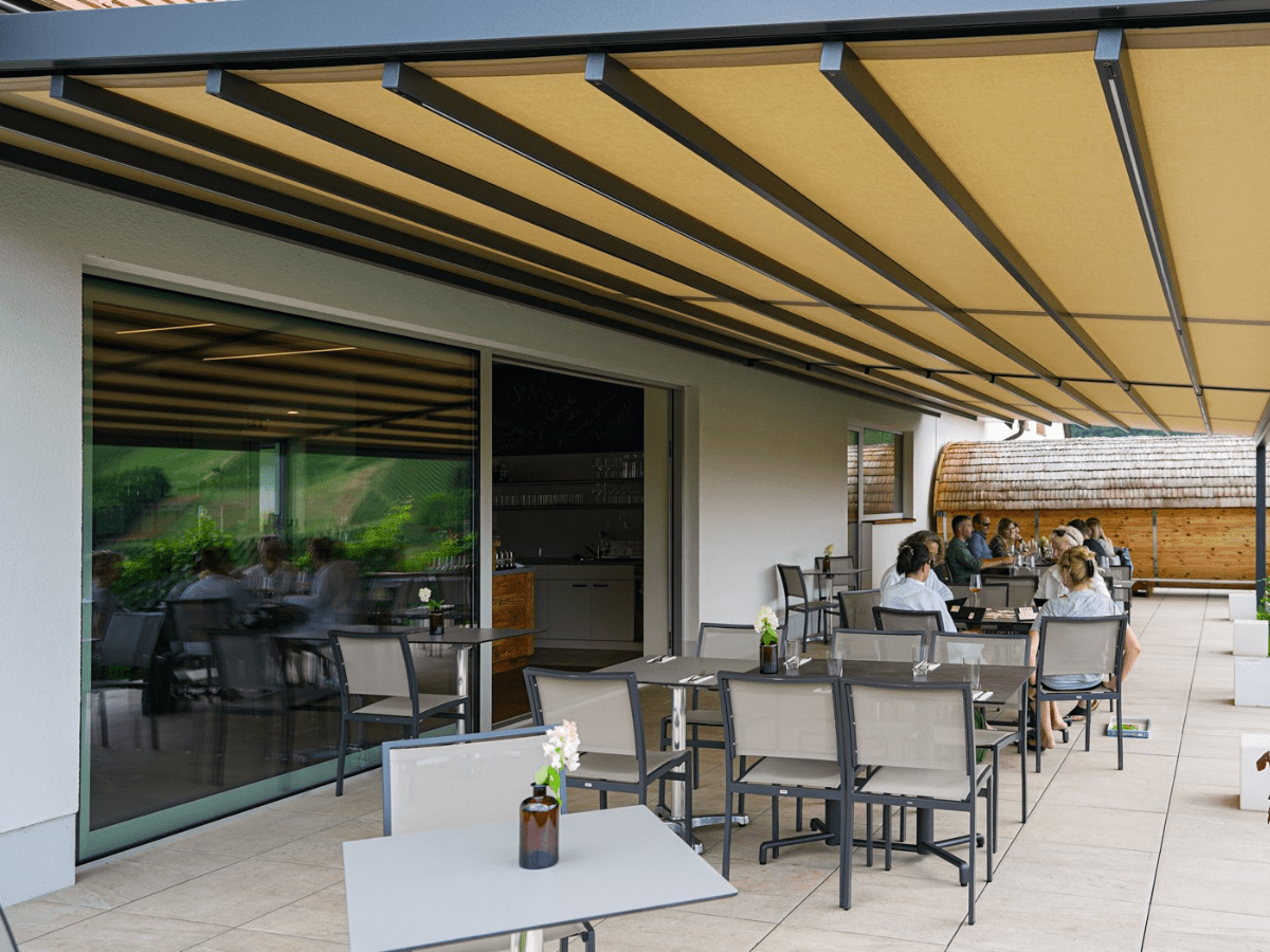 markilux pergola awning with LED lights in the roof posts