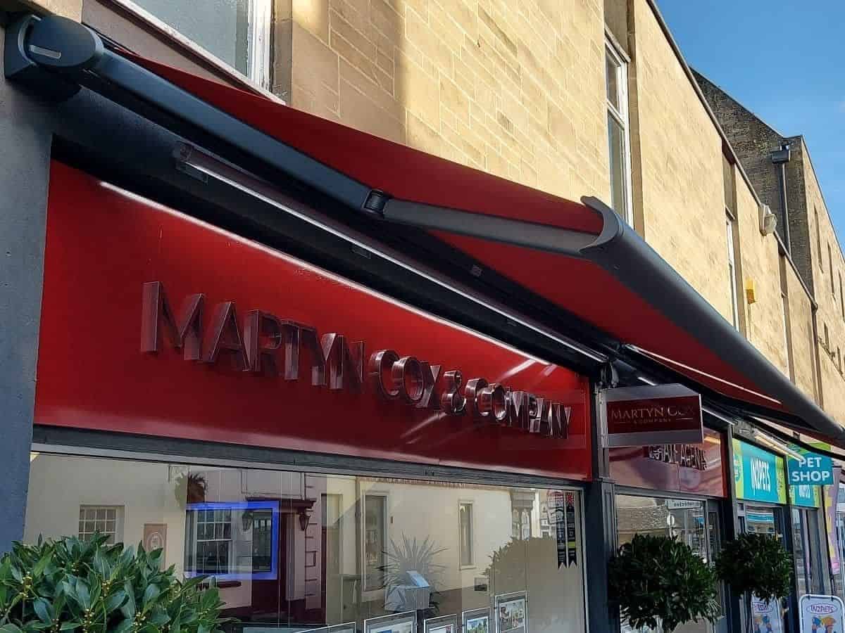 The Weinor Cassita II double awning adds style and functionality to the building exterior of Martyn Cox Estate Agents in Witney, providing shade and protection from the elements while also enhancing the visual appeal of the property.