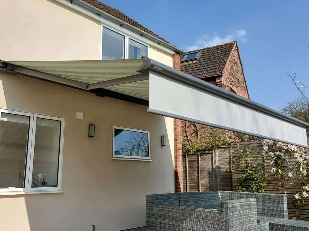The Weinor Opal Design II awning with Valance Plus offers extra protection and privacy with a stylish design, remote control, and wind sensor for easy and convenient operation, making it the perfect addition to your outdoor living space in Oxford.