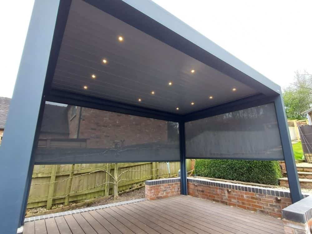 Tarasola Technic freestanding pergola with louvred roof, TechProtect Tarasola remote control side screens and integrated lights