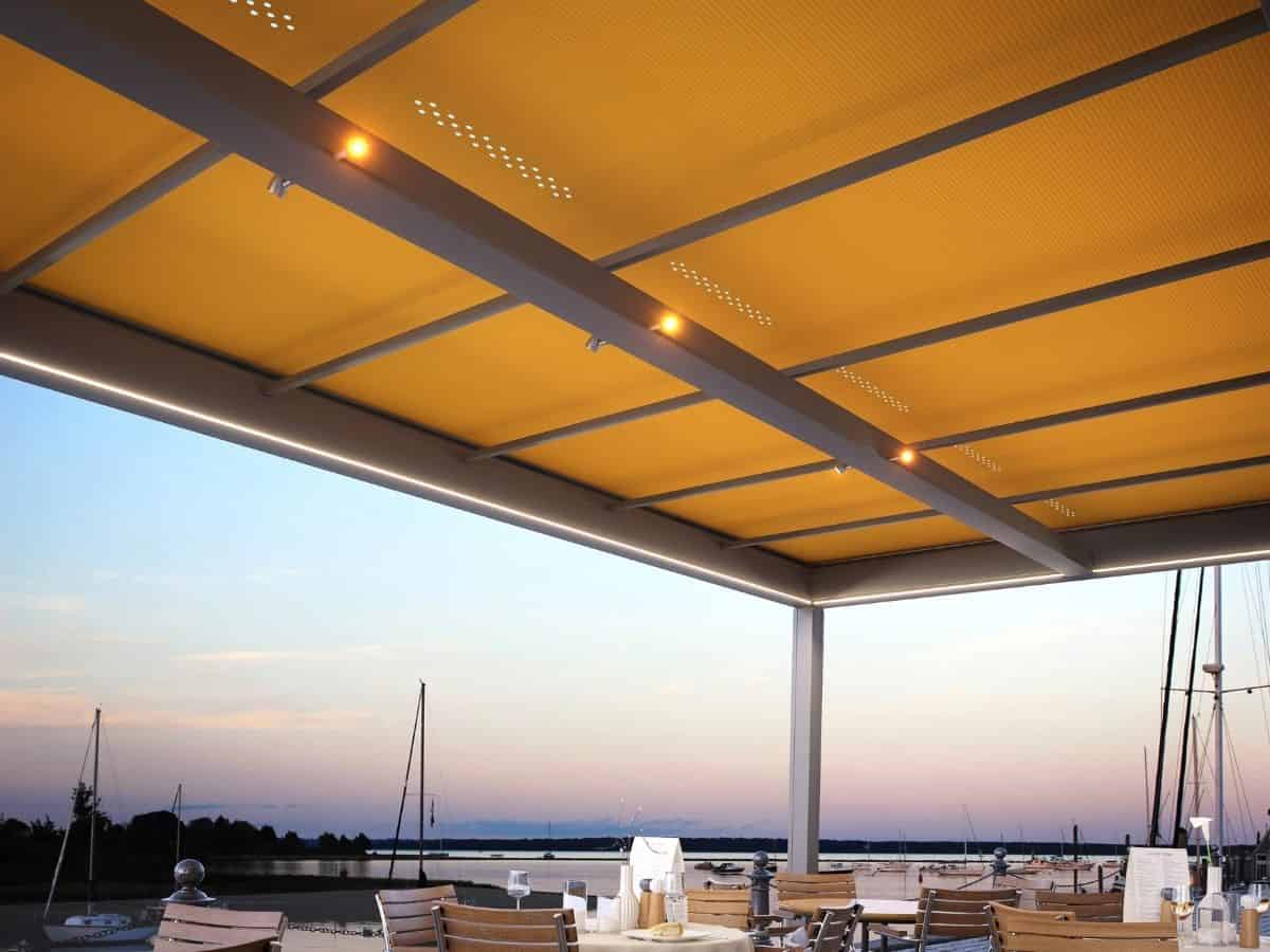 markilux markant pergola system with LED spotlights attached to the awning structure