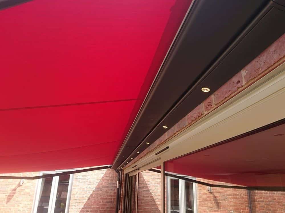 weinor Cassita II canopy fitted to a house in Gloucestershire with LED spotlights. Awnings cost from £3,500