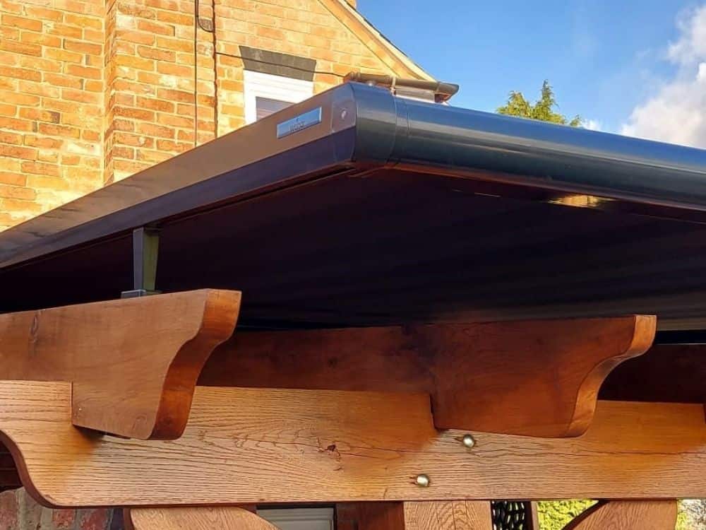 close up of weinor overawning on wooden pergola, fitted in Gloucestershire