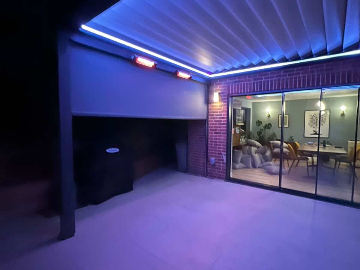 Tarasola Technic wall mounted pergola with LED lights and infrared heater, fitted to the back of a property in Barnet