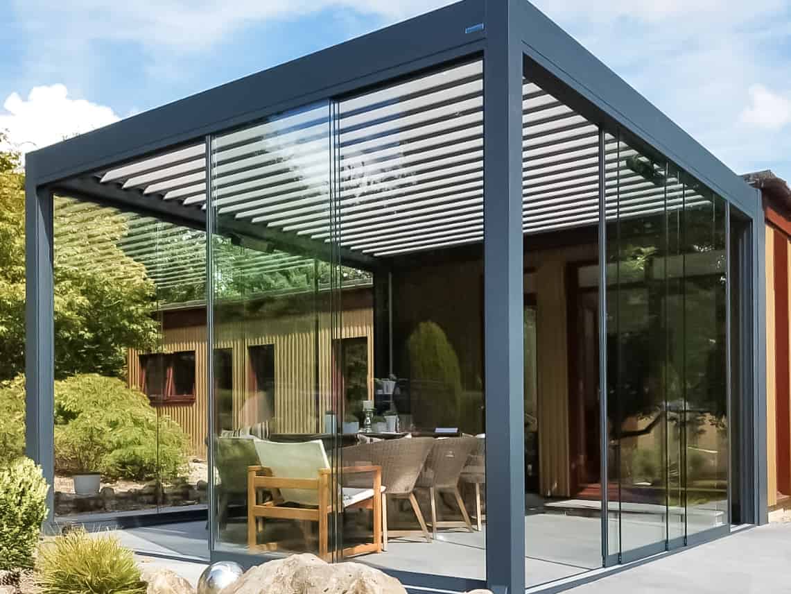 Luxury Aluminium louvred roof with frameless glass sliding doors an infrared heating