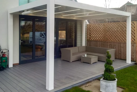 Cotswold's installation in Middlesbrough of SeeSky-Bio Louvred Roof Pergola with LED lights on