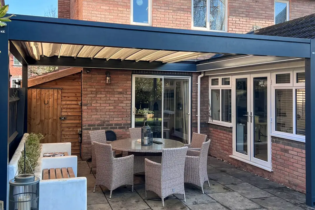 KE Outdoor Design Isola 3 Luxury Retracting Roof Pergola installed by Cotswolds Awnings and Pergolas